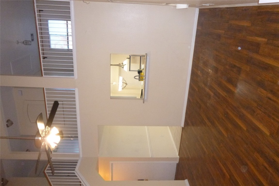 1016 Stacia's Way Pflugerville, TX 78660 - Photo 4 of 34 living room has laminate floors, ceiling fan, and a vaulted ceiling