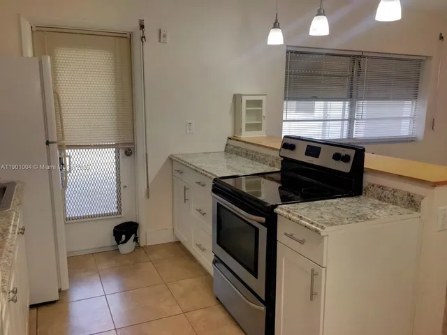 $1,200 | 3515 Van Buren Street, Unit 104, Hollywood, FL 33021