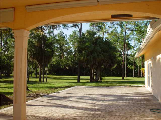 5475 Reynolds Road Lake Worth, FL 33449 - Photo 2 of 9 a view of a volley ball court