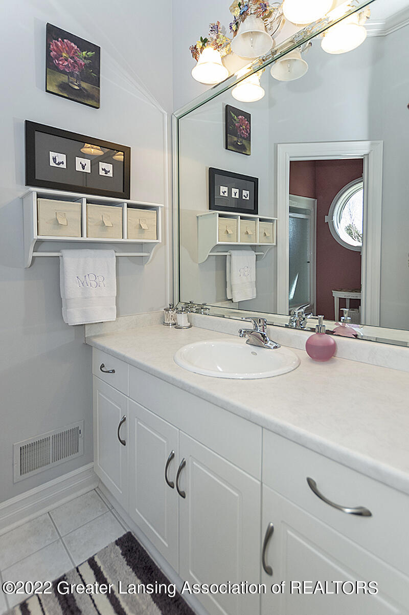 2716 North Every Road Mason, MI 48854 - Photo 32 of 65 Jack and Jill Bathroom