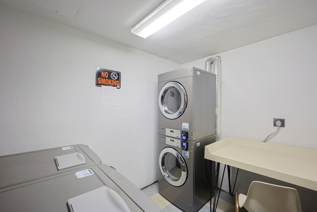 16 Erick Road, Unit 34 Mansfield, MA 02048 - Photo 13 of 14 a utility room with dryer and washer