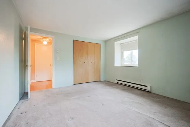 an empty room with window