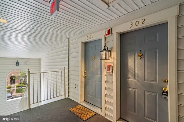 a kitchen with stainless steel appliances granite countertop a refrigerator stove and sink