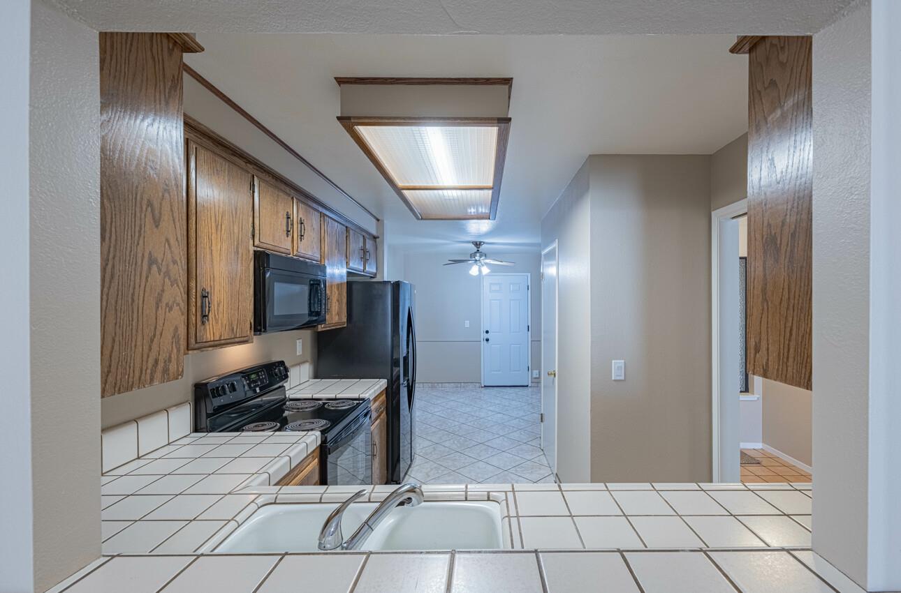 1840 Cherokee Drive, Unit 1 Salinas, CA 93906 - Photo 12 of 32 a view of a livingroom with furniture and a flat screen tv
