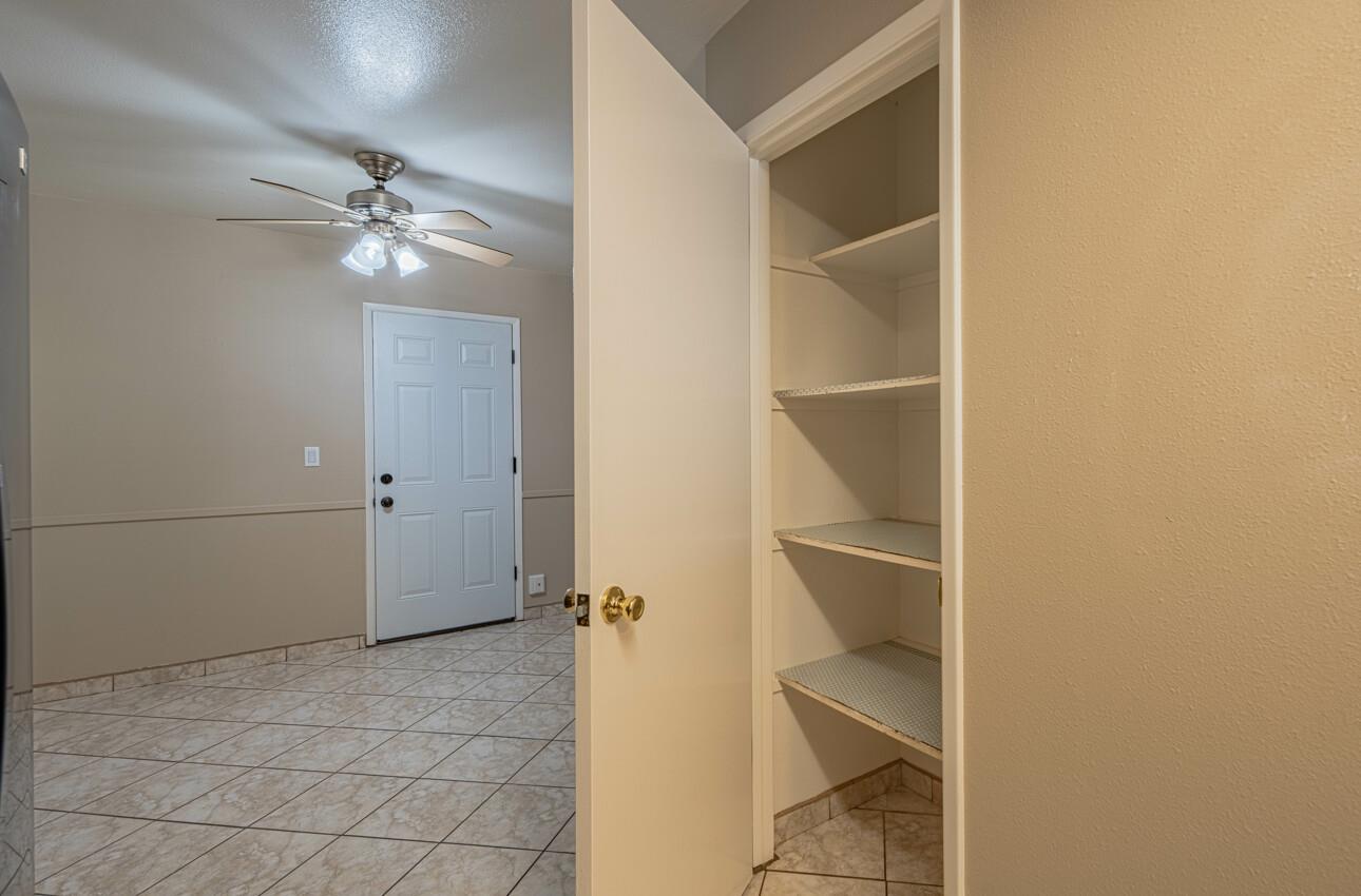 1840 Cherokee Drive, Unit 1 Salinas, CA 93906 - Photo 17 of 32 a view of an empty room with a fan