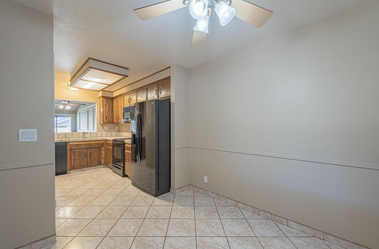 1840 Cherokee Drive, Unit 1 Salinas, CA 93906 - Photo 19 of 32 a view of kitchen with furniture and refrigerator