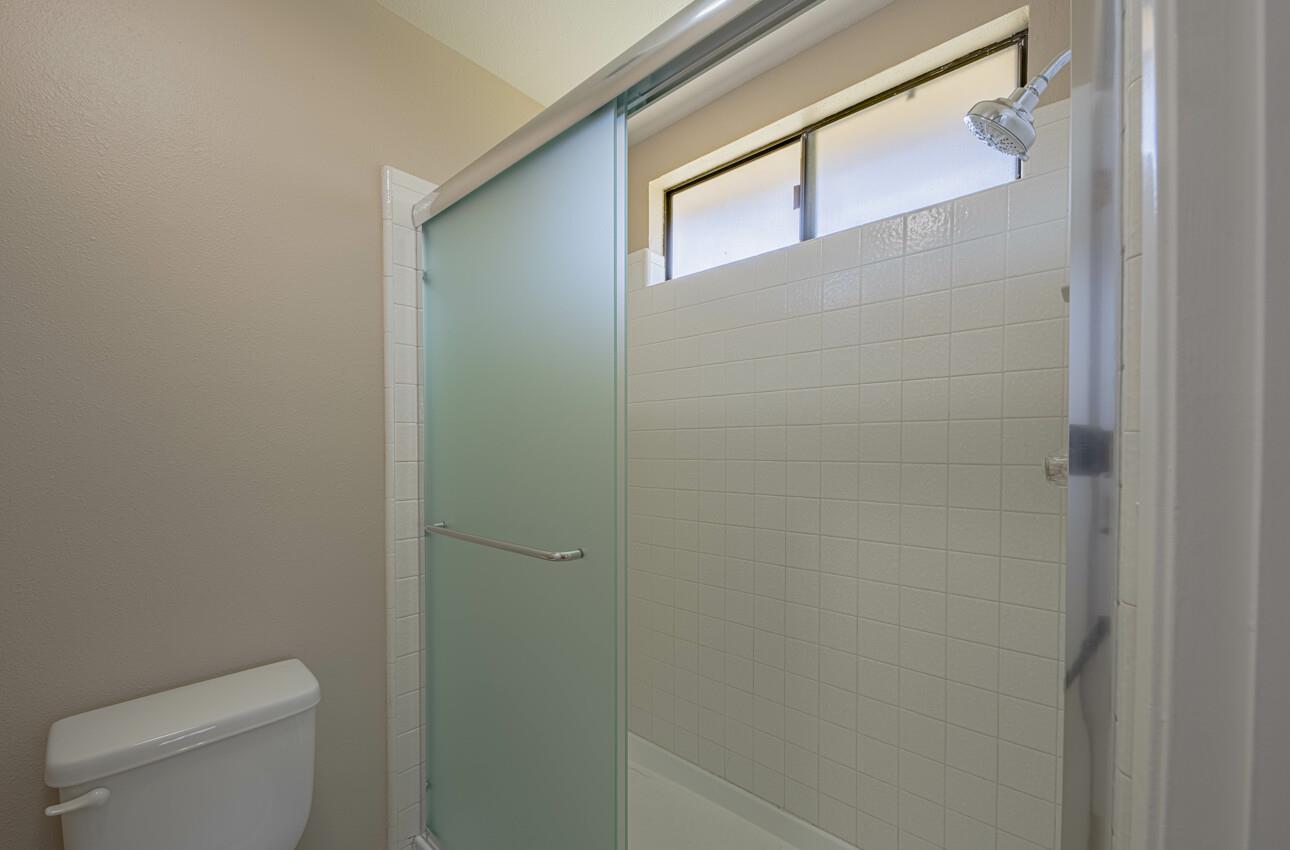 1840 Cherokee Drive, Unit 1 Salinas, CA 93906 - Photo 24 of 32 a bathroom with a toilet and a shower