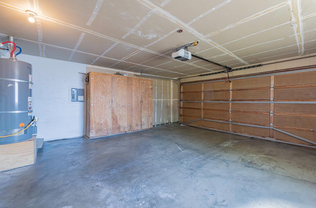 1840 Cherokee Drive, Unit 1 Salinas, CA 93906 - Photo 30 of 32 a view of an empty room with wooden shelves