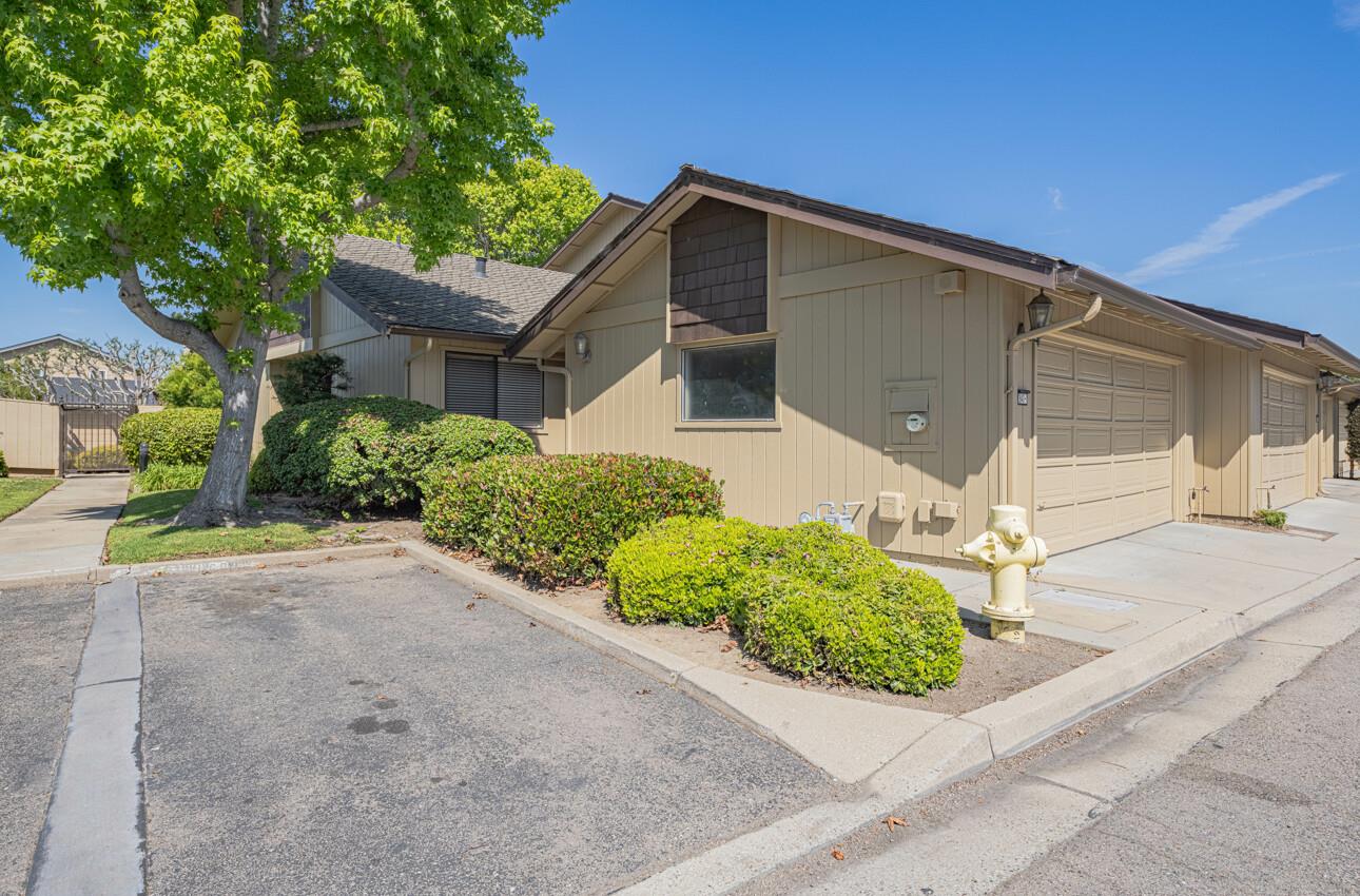 1840 Cherokee Drive, Unit 1 Salinas, CA 93906 - Photo 31 of 32 a front view of a house with a yard and garage