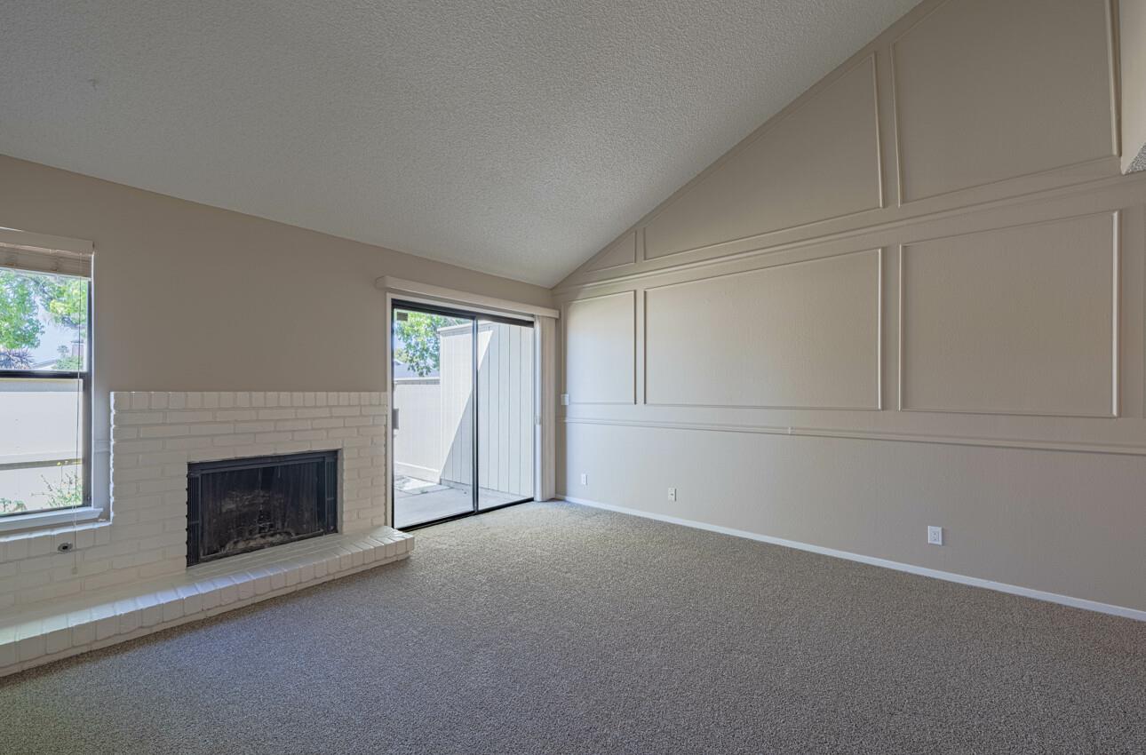 1840 Cherokee Drive, Unit 1 Salinas, CA 93906 - Photo 7 of 32 a view of empty room with a fireplace