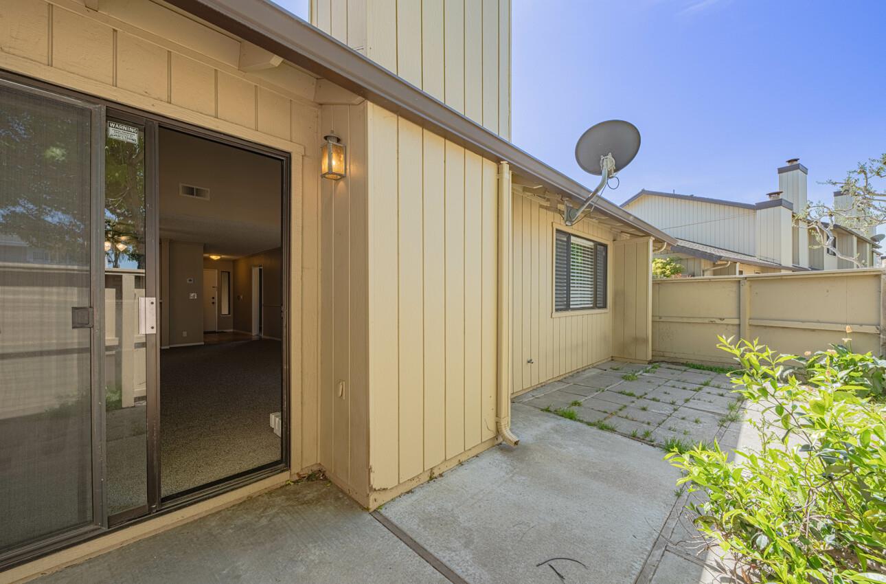 1840 Cherokee Drive, Unit 1 Salinas, CA 93906 - Photo 9 of 32 a front view of a house with a glass door
