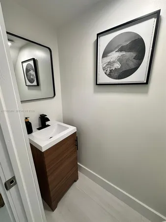 a room with a wall painting and a painting on the wall