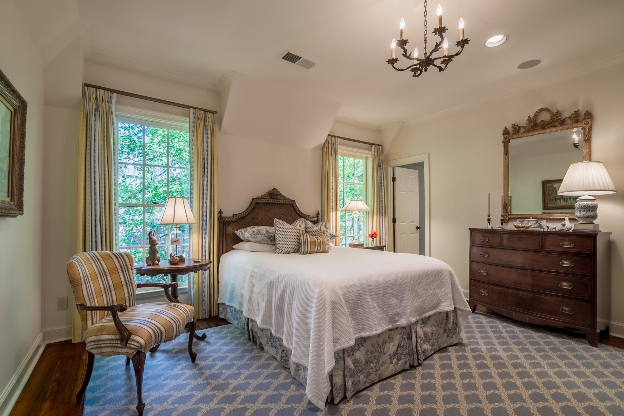 2951 Iroquois Road Memphis, TN 38111 - Photo 18 of 24 a bedroom with a bed and a chair