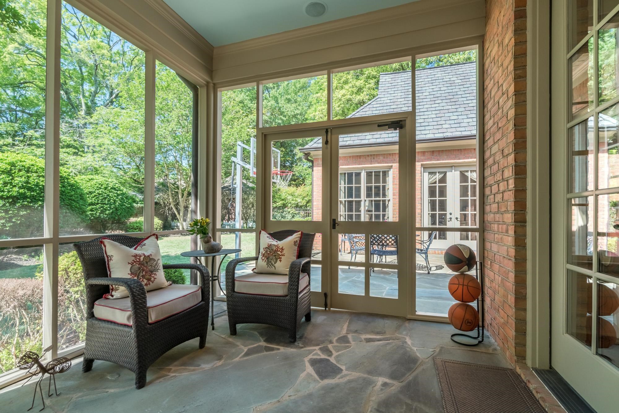 2951 Iroquois Road Memphis, TN 38111 - Photo 21 of 24 a living room filled with furniture and a floor to ceiling window