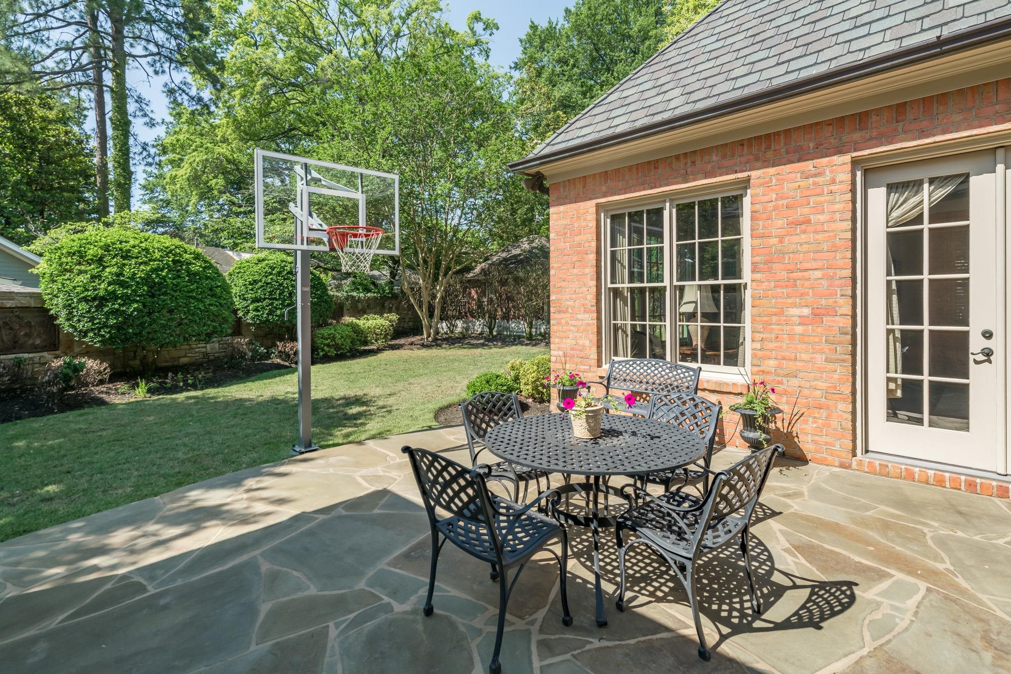 2951 Iroquois Road Memphis, TN 38111 - Photo 22 of 24 a view of a house with backyard and sitting area