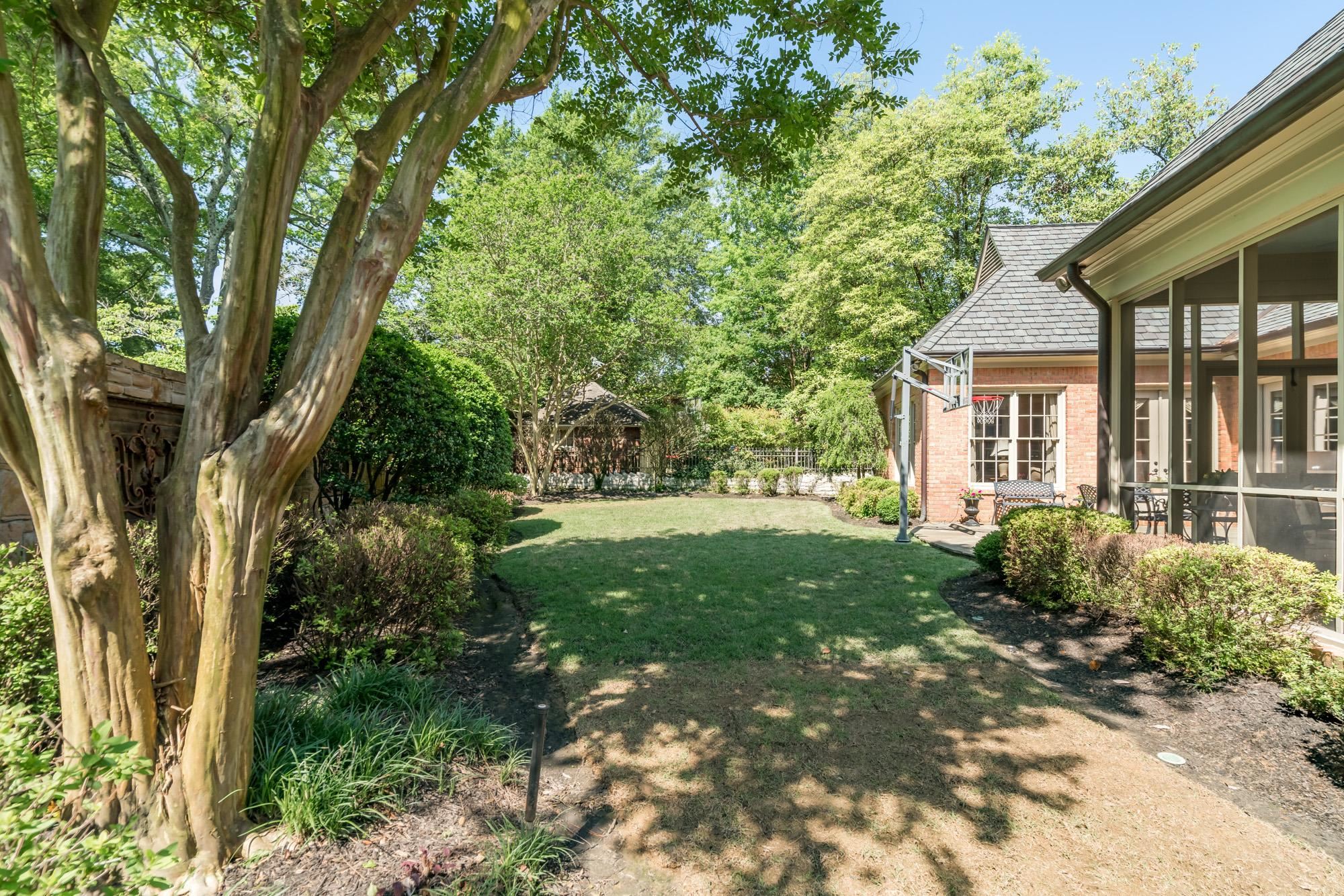 2951 Iroquois Road Memphis, TN 38111 - Photo 24 of 24 a view of a house with backyard and garden