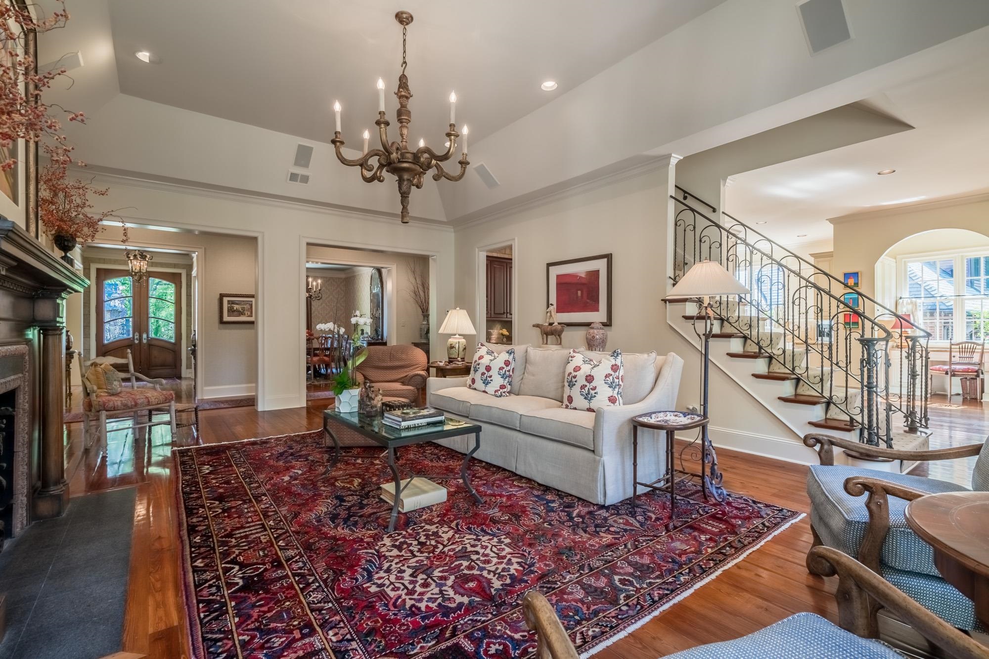 2951 Iroquois Road Memphis, TN 38111 - Photo 5 of 24 a living room with furniture and a chandelier