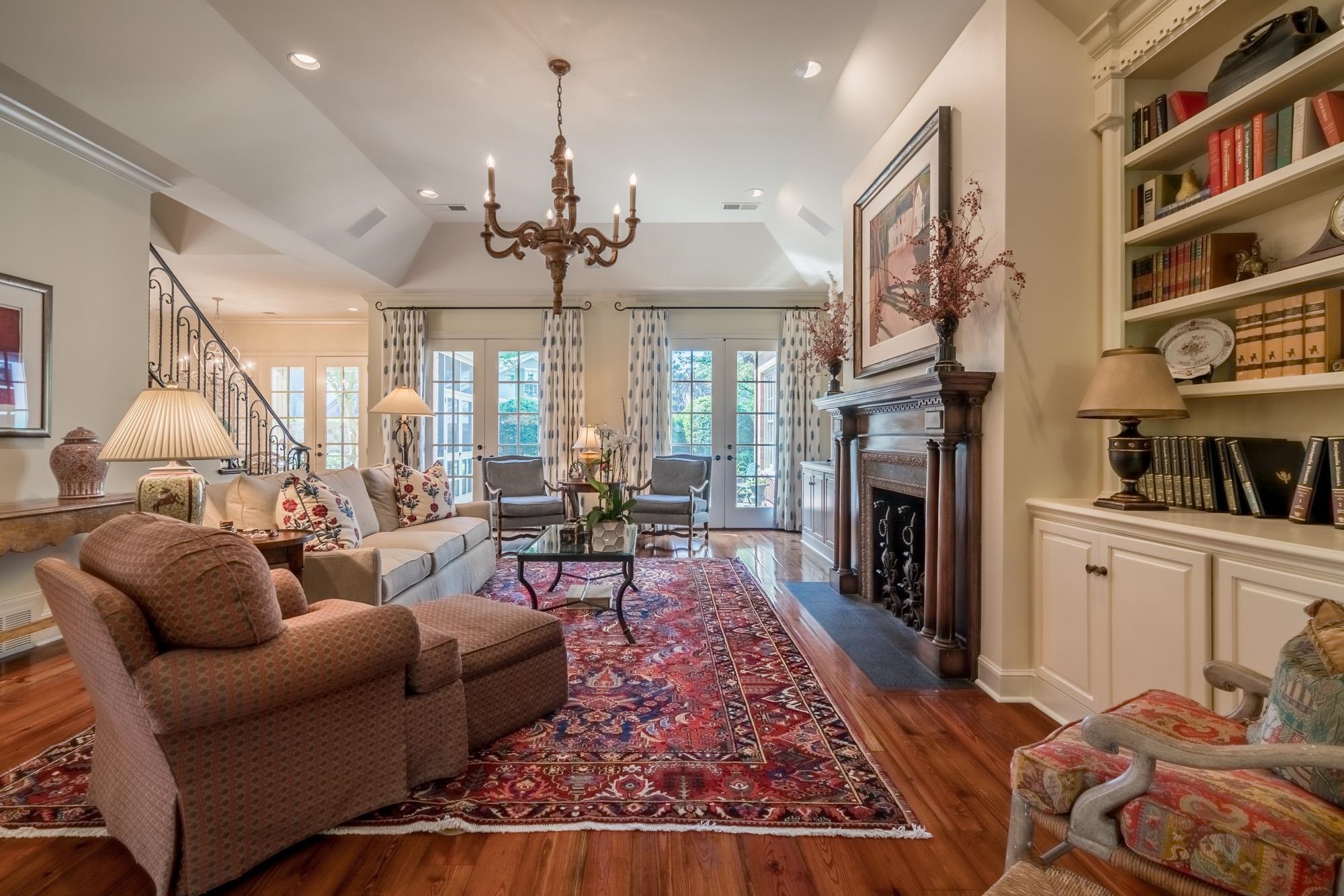 2951 Iroquois Road Memphis, TN 38111 - Photo 6 of 24 a living room with furniture fireplace and a chandelier