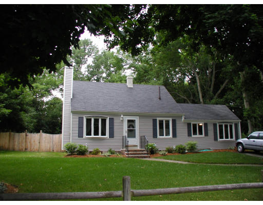 7 Alderbrook Road Andover, MA 01810 - Photo 1 of 1 a front view of a house with a garden