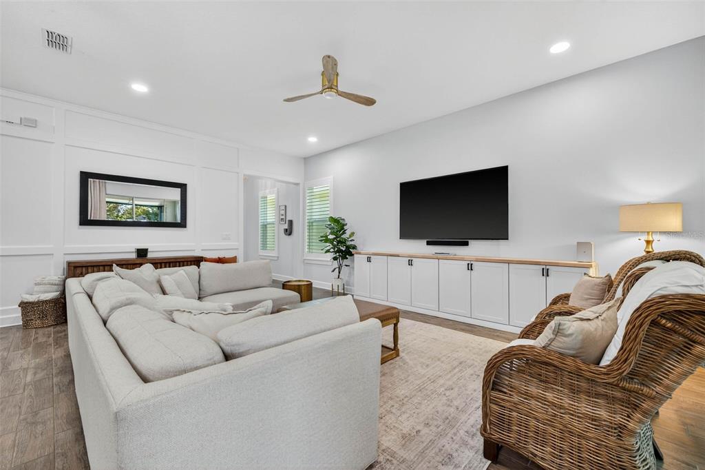 10522 Cardera Drive Riverview, FL 33578 - Photo 13 of 43 a living room with furniture and a flat screen tv