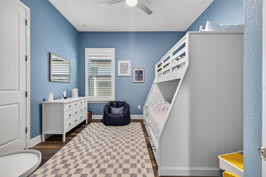10522 Cardera Drive Riverview, FL 33578 - Photo 25 of 43 a bathroom with a bathtub sink and mirror