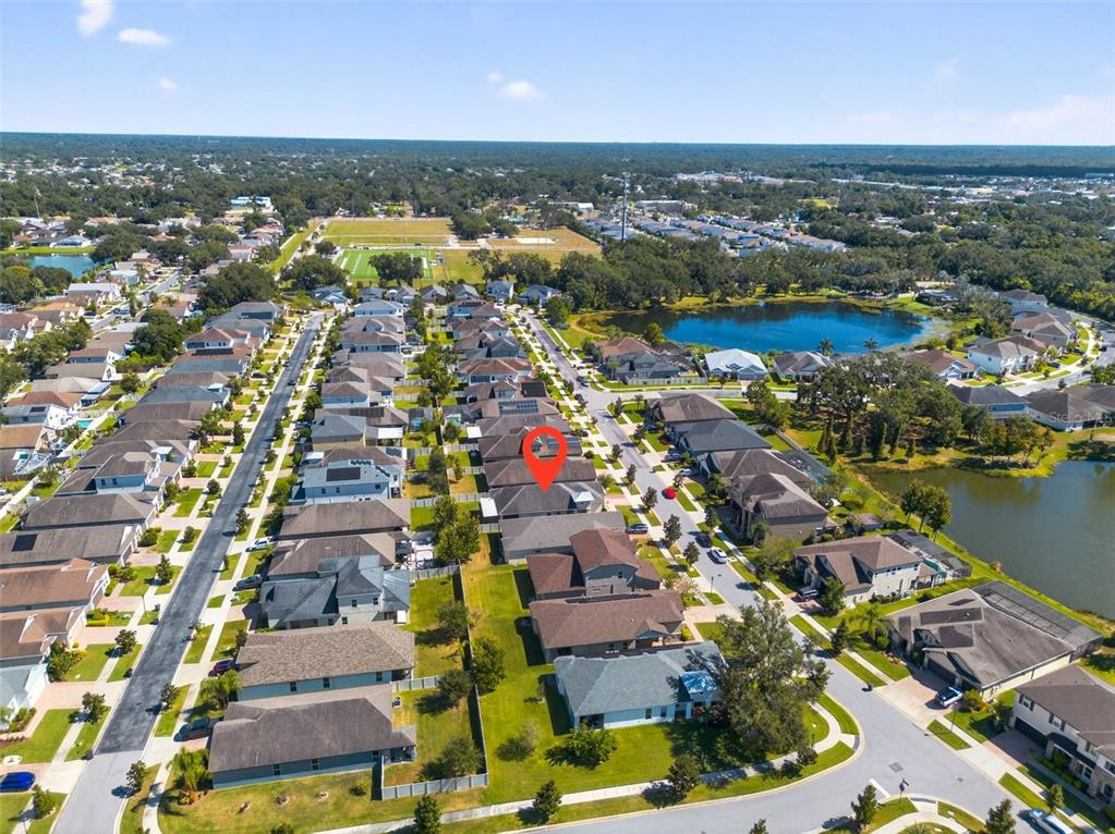 10522 Cardera Drive Riverview, FL 33578 - Photo 40 of 43 an aerial view of residential houses with outdoor space