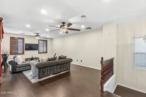 a bathroom with a sink a toilet and shower curtain