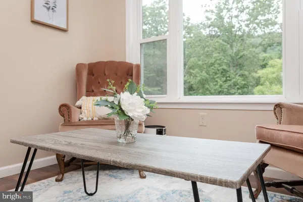 a bathroom with a sink a toilet and a shower
