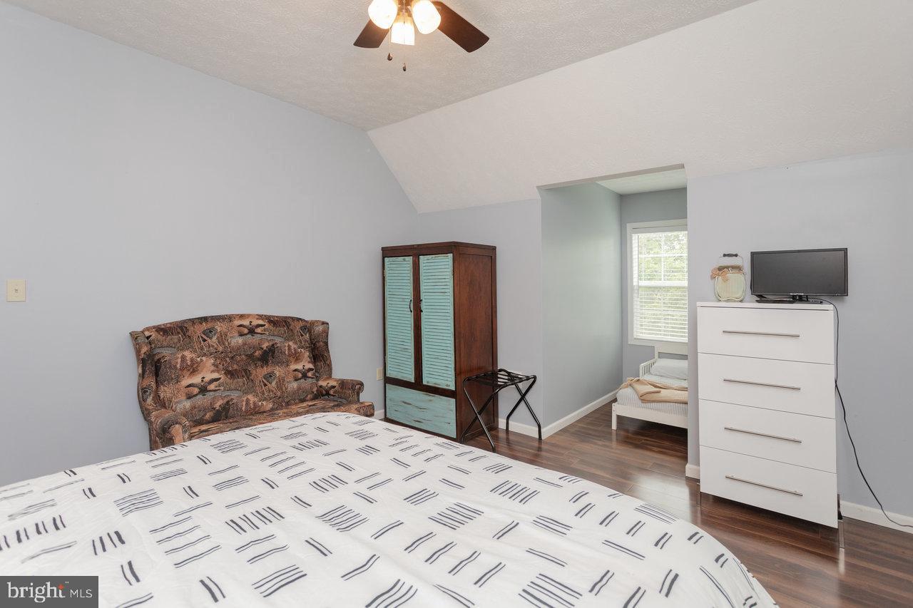 159 Park View Shenandoah, VA 22849 - Photo 33 of 66 a bedroom with a bed and wooden floor