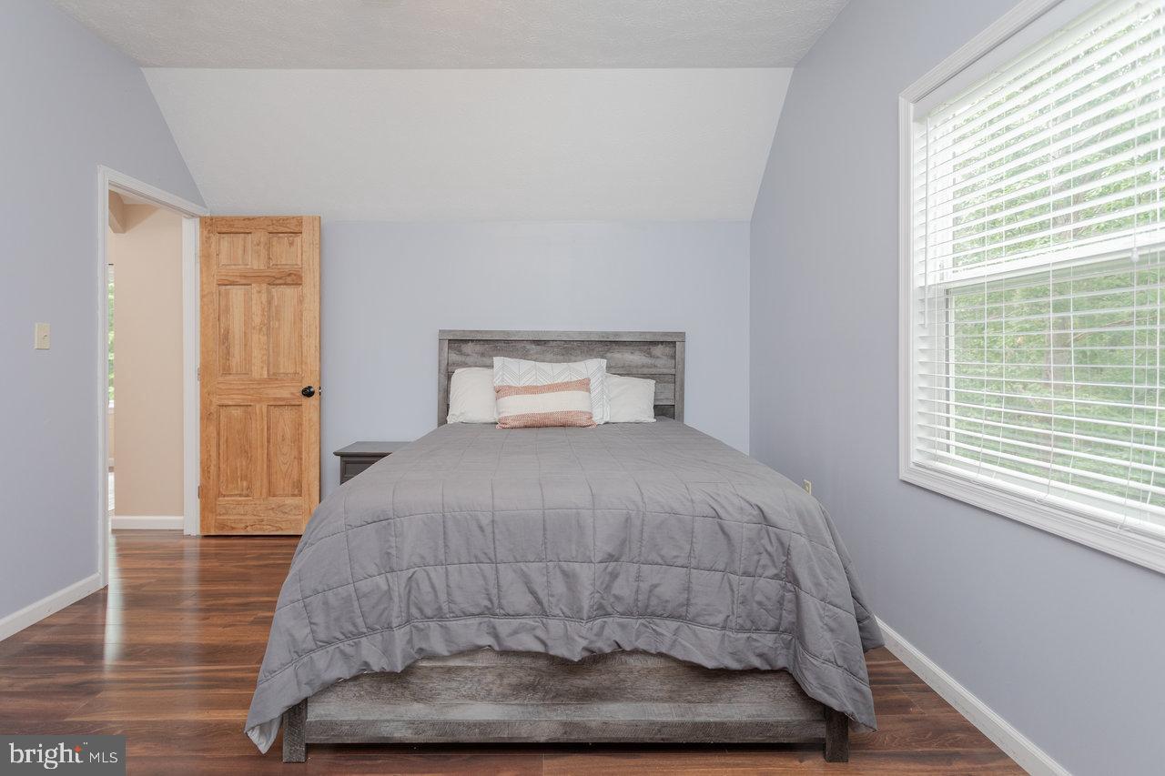 159 Park View Shenandoah, VA 22849 - Photo 38 of 66 a bedroom with a bed and wooden floor