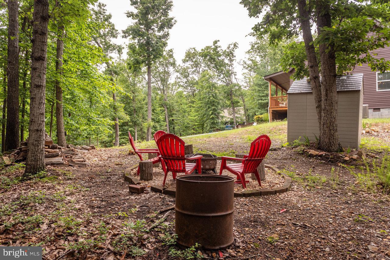 159 Park View Shenandoah, VA 22849 - Photo 64 of 66 a view of a chairs and table in backyard