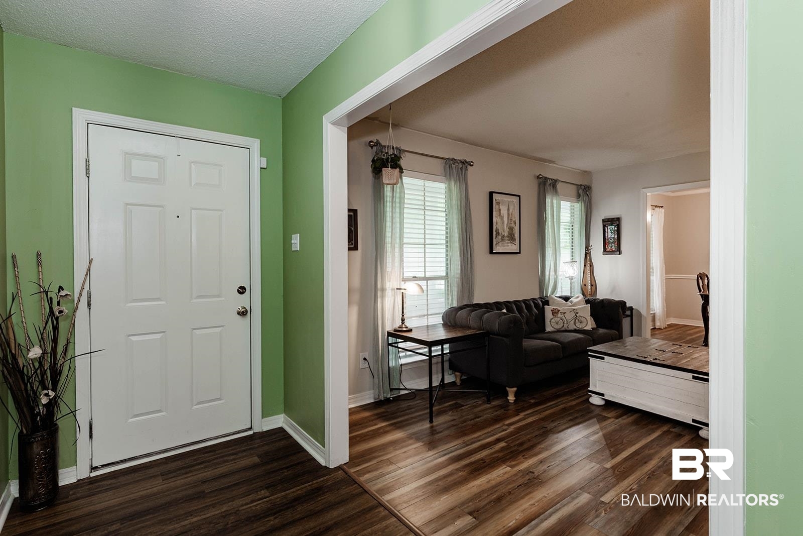 2920 Quail Creek Run Mobile, AL 36695 - Photo 8 of 33 Entryway with dark wood-style floors and a textured ceiling