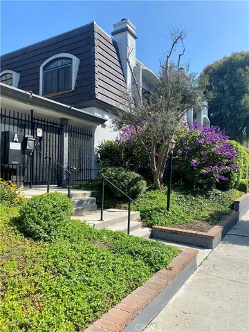 a view of a house with a garden