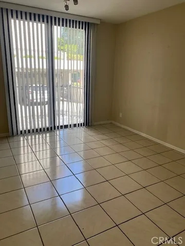 a stove top oven sitting inside of a kitchen