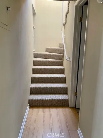 a living room with a couch and a stove