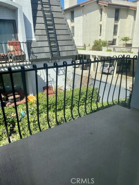 8105 Redlands Street, Unit 107 Playa del Rey, CA 90293 - Photo 22 of 43 a view of a balcony with an outdoor space