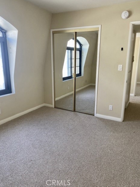 8105 Redlands Street, Unit 107 Playa del Rey, CA 90293 - Photo 25 of 43 an empty room with mirror and entrance