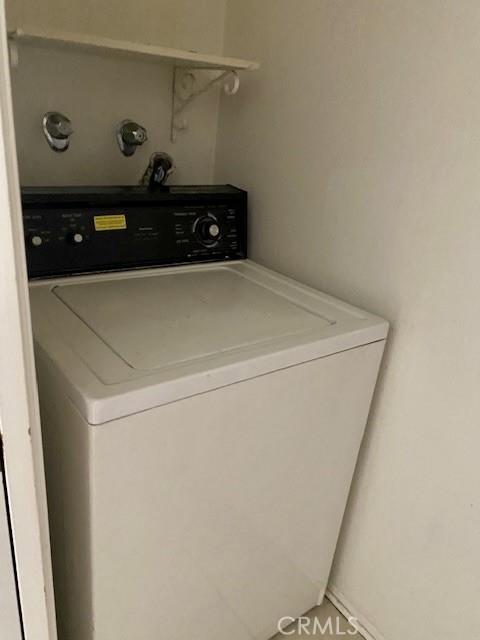 8105 Redlands Street, Unit 107 Playa del Rey, CA 90293 - Photo 33 of 43 a utility room with dryer and washer
