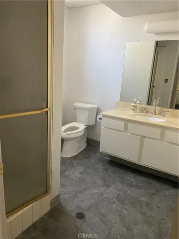 a room with gym equipment and mirror