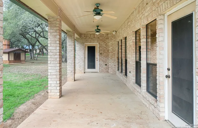 a view of a porch with a fireplace