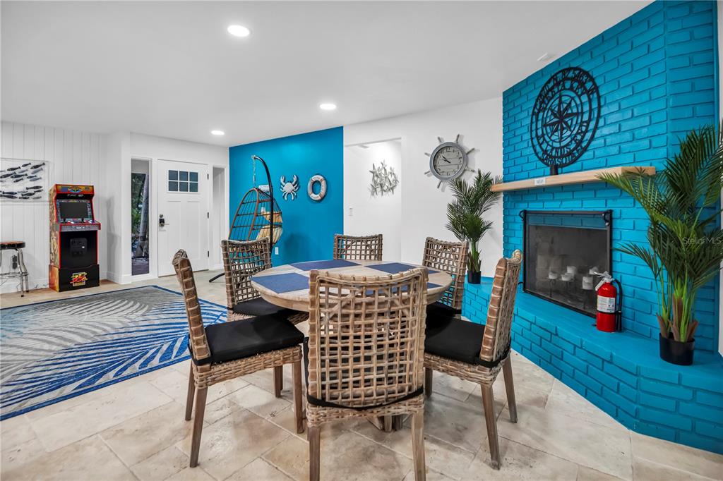 31 Lands End Lane Sarasota, FL 34242 - Photo 12 of 49 a view of a livingroom with furniture and a fireplace