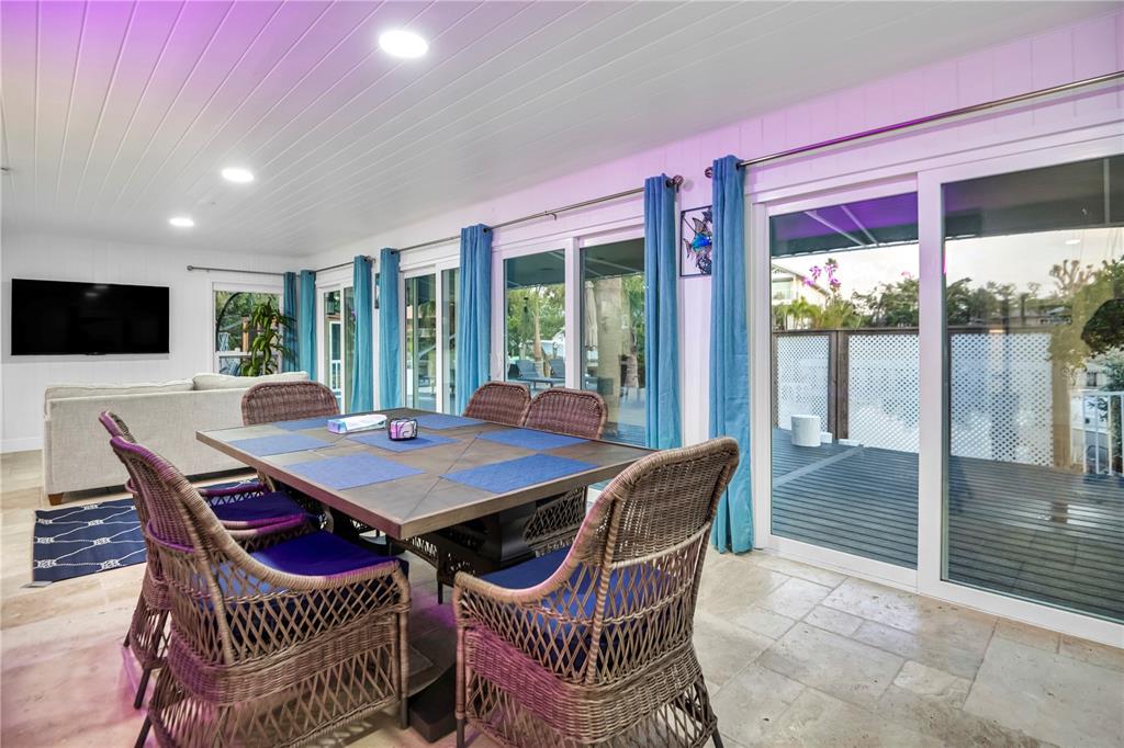 31 Lands End Lane Sarasota, FL 34242 - Photo 21 of 49 a view of a dining room with furniture window and outside view