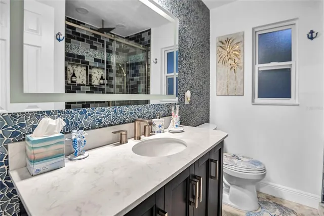 a bathroom with a sink and a toilet