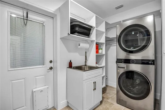 a utility room with dryer and washer