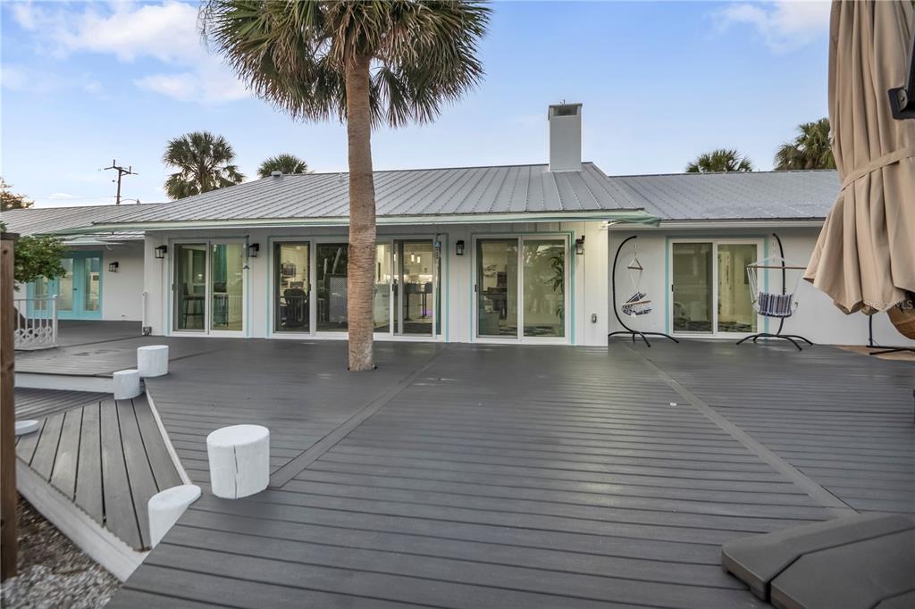 31 Lands End Lane Sarasota, FL 34242 - Photo 44 of 49 a front view of a house with porch