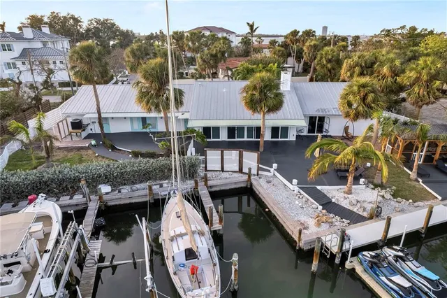 an aerial view of houses with deck