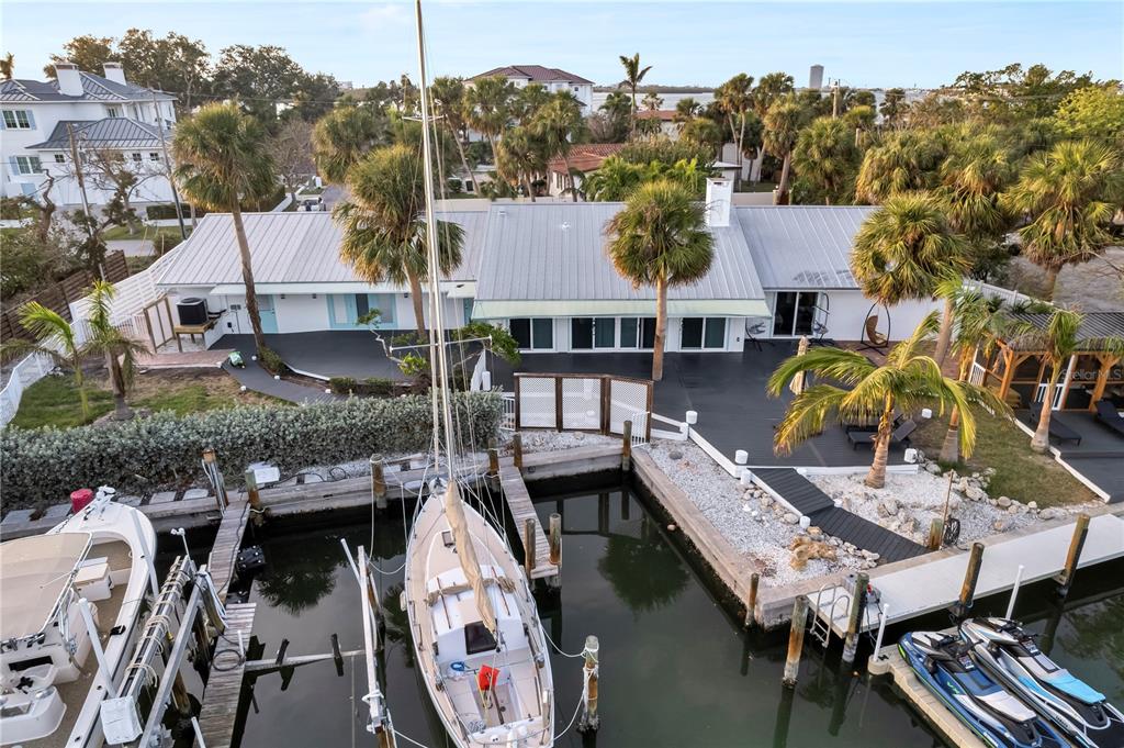 31 Lands End Lane Sarasota, FL 34242 - Photo 5 of 49 an aerial view of houses with deck