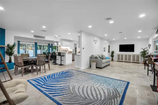 a living room with furniture and a table