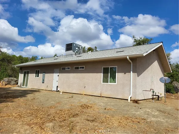 a view of a house with a garage