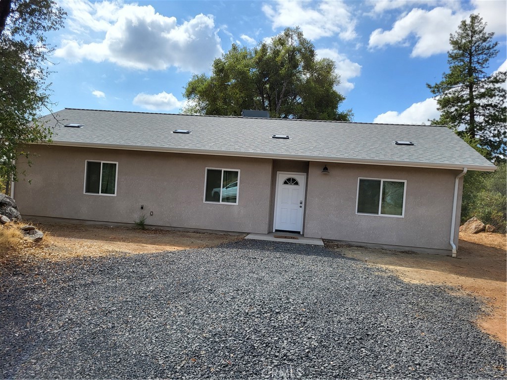 5515 Carleton Road Mariposa, CA 95338 - Photo 2 of 9 a house view with a backyard space